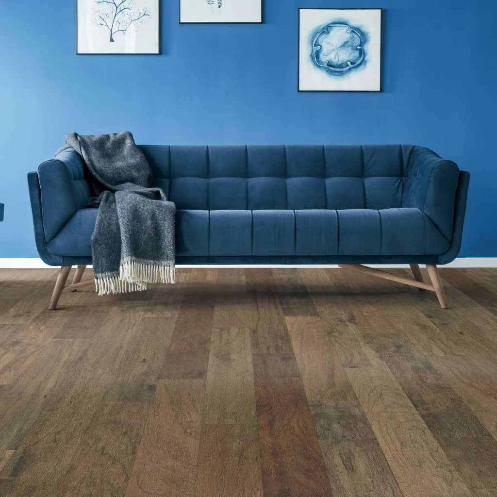 Blue couch on hardwood | Corvin's Floors & Cabinets