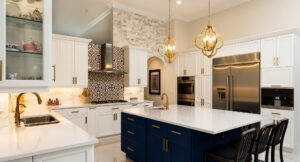 modern kitchen with white shaker cabinets blue island quartz countertops gold pendant lighting stainless steel appliances tile backsplash central kentucky style